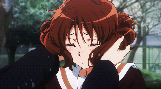 Asuka Euphonium-playing gif showing a graceful moment of musical performance