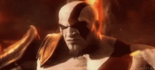 Animated GIF of Kratos, the fierce protagonist from the video game God of War, glaring intensely with a fiery background.