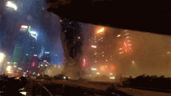 Pacific Rim — Kaiju Nightstorm Over Neon City (GIF) - Gif Abyss