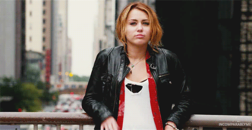 Miley Cyrus Waving Hello and or Goodbye