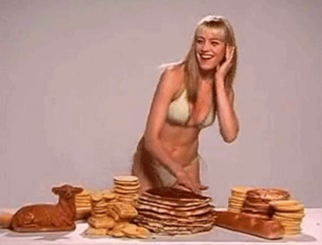 Suddenly, a girl scratching on pancakes